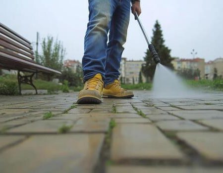 pressure-washing-brick-path-cleaning-and-maintenance-in-outdoor-urban-space-free-photo